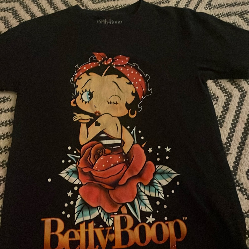 size small, cute print, baggy shirt
